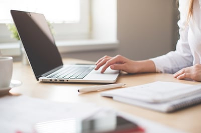 business-woman-working-on-laptop-in-her-office-picjumbo-com-2