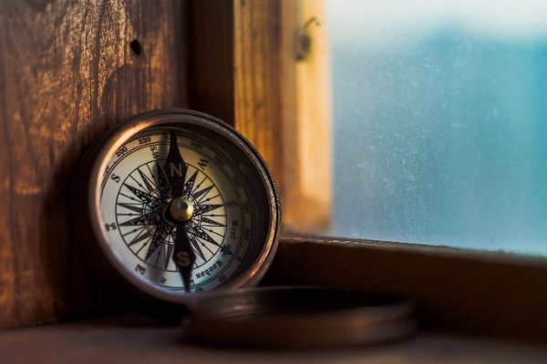 Compass sitting on a shelf