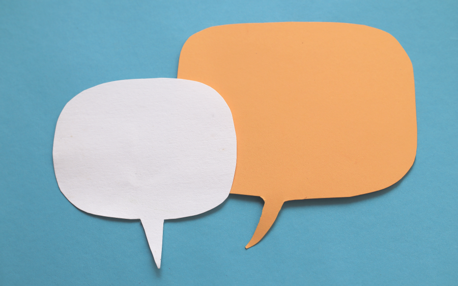 Two speech bubbles against a blue background